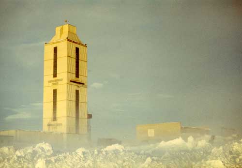 View of the tower and administrative and production building of the Kola Superdeep Borehole in winter.